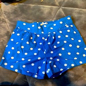 These are blue and white Cotton on kids shorts.